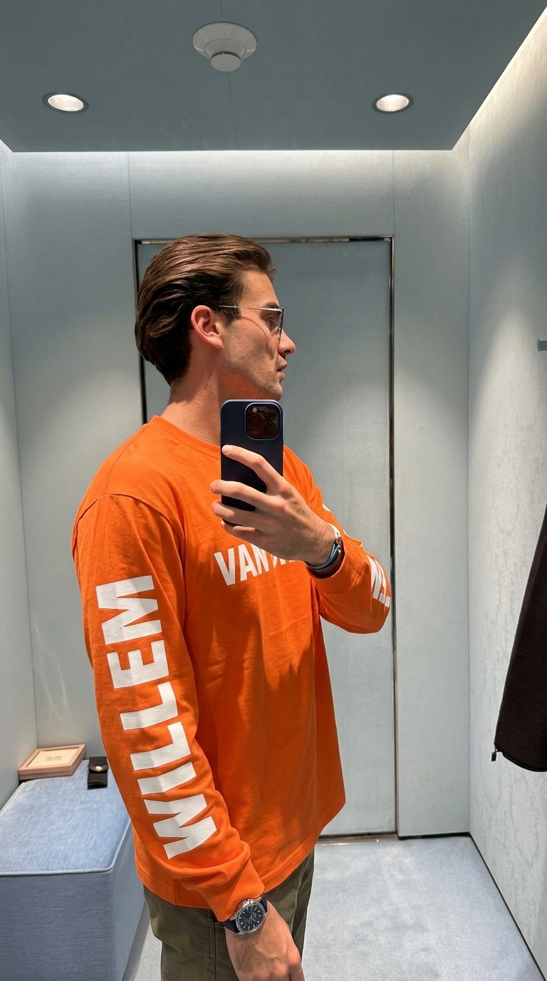 Heren oranje longsleeve 'Van Oranje' met 'Willem' op de mouw — minimalistische Koningsdag heren outfit